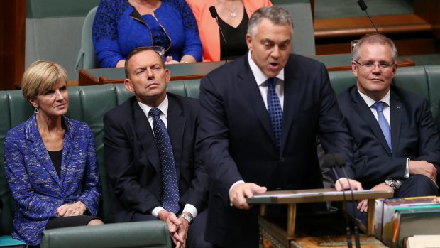 Treasurer Joe Hockey delivers his second budget in front of Prime Minister Tony Abbott, Foreign Affairs Minister Julie Bishop and Social Services Minister Scott Morrison.