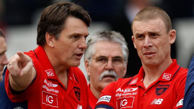 Right direction: Senior coach Paul Roos (left) and his senior assistant coach Simon Goodwin steered the Demons to 10 wins this season.