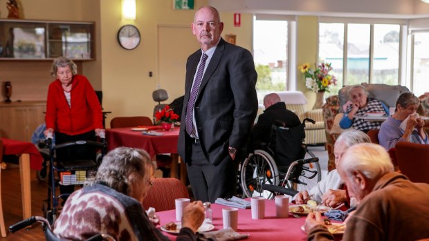 Kalyna Care CEO Darren Leech with residents eating lunch at the former Ukrainian aged care home
