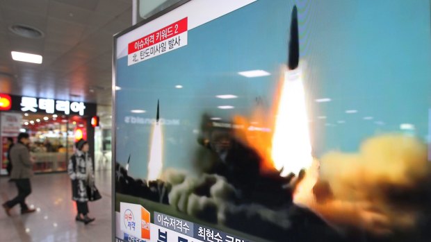 A railway station TV in Seoul shows file footage of North Korea's recent missile tests.