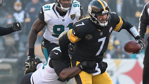 Pittsburgh Steelers quarterback Ben Roethlisberger gets sacked by the Jaguars.