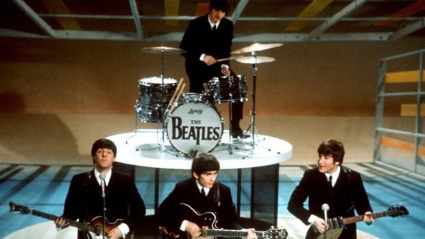 The Beatles perform on the CBS <i>Ed Sullivan Show</i> in New York on February 9, 1964.