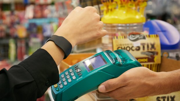 Rather than reach into your pocket, the Cash by Optus band lets you pay at the counter with a wave of your arm.