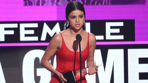 Selena Gomez accepts the award favourite female artist pop/rock at the American Music Awards.