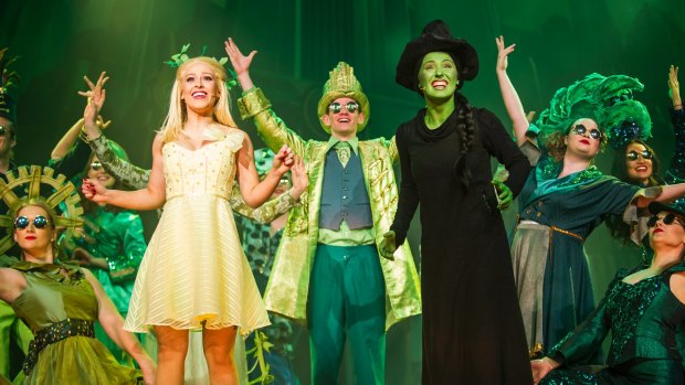  Laura Murphy, left in white, as Glinda and Loren Hunter, right, in black  as Elphaba in <i>Wicked</i> which won five CAT Awards.