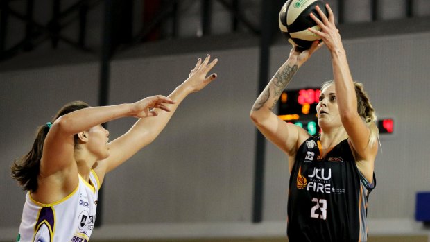 Townsville Fire's Carla George lines up a shot.