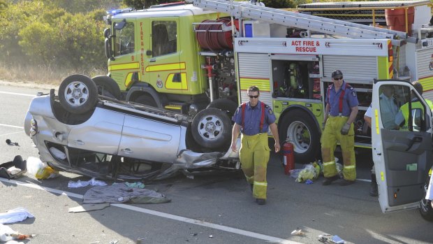 Emergency services access the scene of a single vehicle accident on the Federal Highway.