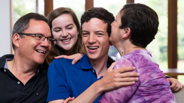 Samuel Garrett with his family, Marcela and Stephen Garrett and sister, Emma, 15, after he finds out his ATAR.