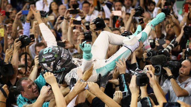 Relief: Nico Rosberg celebrates his maiden Formula One world championship.