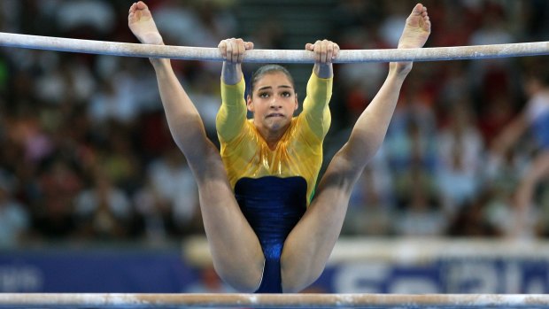 Lais Souza on the uneven bars during the women's qualifications of the 40th World Artistic Gymnastics Championships  on September 02, 2007.