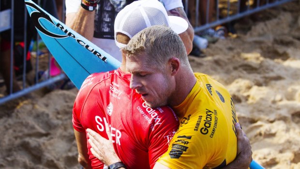 Emotional: Kelly Slater and Mick Fanning at the Pipe Masters.