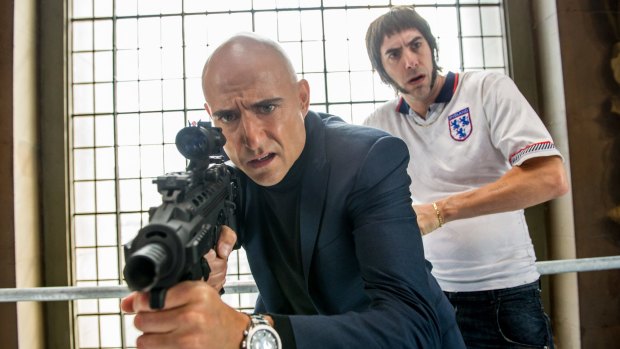 Mark Strong (left) and Sacha Baron Cohen in <i>The Brothers Grimsby</i>.