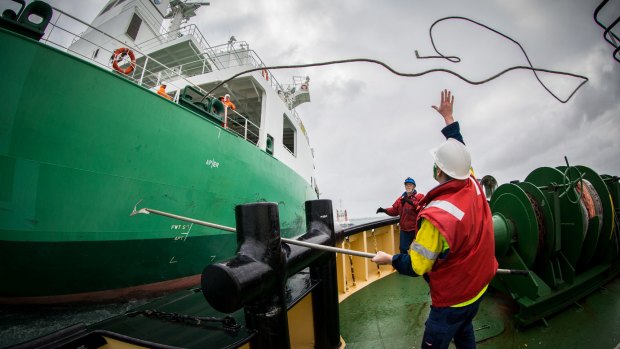 Engineer Sam Bassham in place to catch a line, with crewman Paul Westlake ready to help.