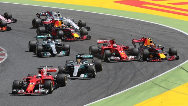 Ferrari driver Kimi Raikkonen went out after this incident on the first corner with Red Bull driver Max Verstappen.