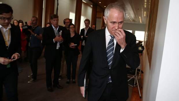 Communications Minister Malcolm Turnbull after speaking to the media.