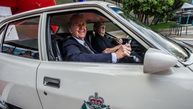 A 1974 pursuit vehicle, Ford Falcon XB 351. The last official driver of the car former Station Sergeant John Hillier and former Senior Sergeant Bill Mackey get behind the wheel for old times sake.