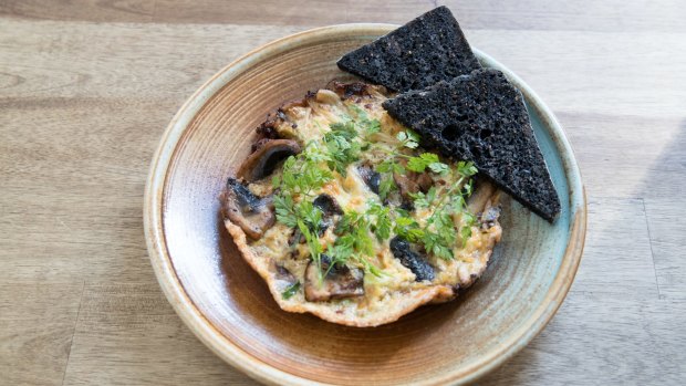 The mushroom omelette with charred leek is packed with umami.