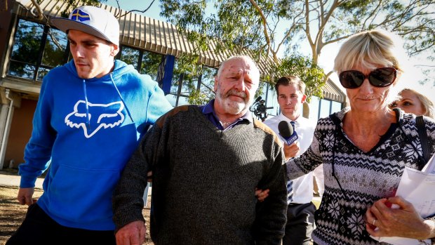 Bruce Akers, centre, is granted bail on animal cruelty charges.