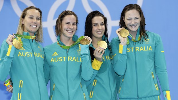Golden age: Australia's 4x100m freestyle relay team of Emma McKeon, Bronte Campbell, Brittany Elmslie and Cate Campbell show off the gold medals in Rio.
