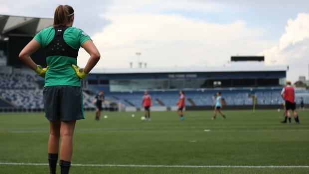 Matildas goalkeeper Lydia Williams shouts instructions to her teammates while training in Geelong. 