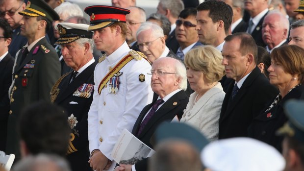 From left, Prince Charles, Prince of Wales, Prince Harry, Irish President Michael Higgins, his wife Sabina Higgins and Australian Prime Minister Tony Abbott and Margie Abbott attend the Commonwealth and Irish Memorial Service at Cape Helles in Seddulbahir, Turkey. 