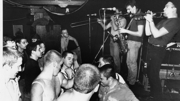 An early Strange Tenants gig: high energy crowds and music.