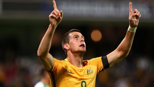 Tom Juric celebrates a goal in the World Cup qualifier against Iraq in September.
