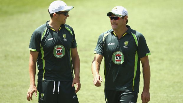 Peter Siddle and Ryan Harris at the Gabba on Tuesday. Both have been dropped from the Test team.