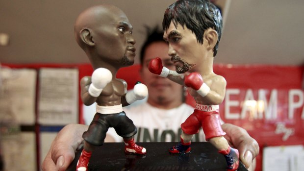 Ready to rumble: Figurines of Floyd Mayweather and Manny Pacquiao ahead of their  fight.