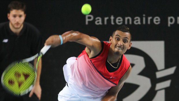 Winnng form: Nick Kyrgios serves to Tomas Berdych during their semi-final at Marseille.