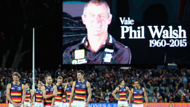 Adelaide players paid tribute to coach Phil Walsh last July.