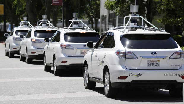 A row of Google's self-driving cars.