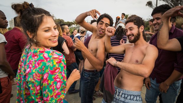 While some were waking up, others were still partying at St Kilda Beach on Friday morning. 