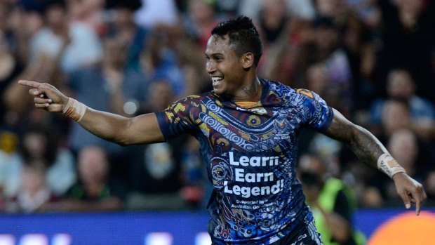 Starring role: Ben Barba celebrates after scoring a try for the Indigenous All Stars in 2013.