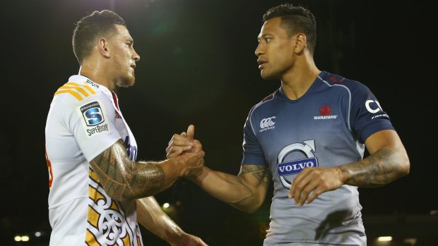 Mutual respect: Sonny Bill Williams and Israel Folau shake hands after the Waratah's narrow victory over the Chiefs.