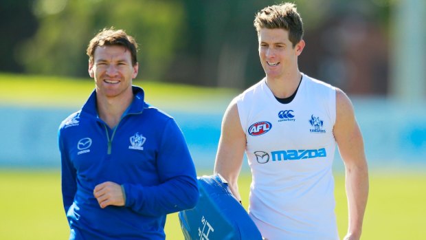 North's Brent Harvey and Nick Dal Santo at training.