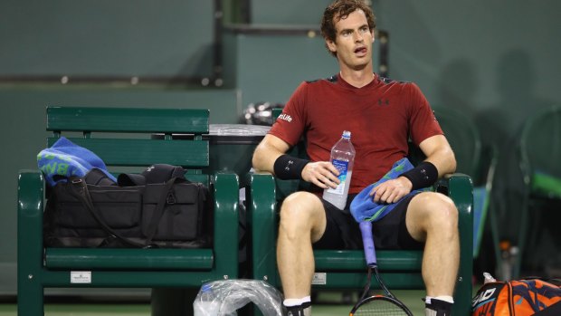 Andy Murray shows his dejection during his straight-sets defeat by Vasek Pospisil.