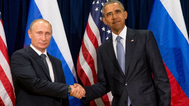 United States President Barack Obama, right, and Russia's President Vladimir Putin pose before a bilateral meeting on Monday.