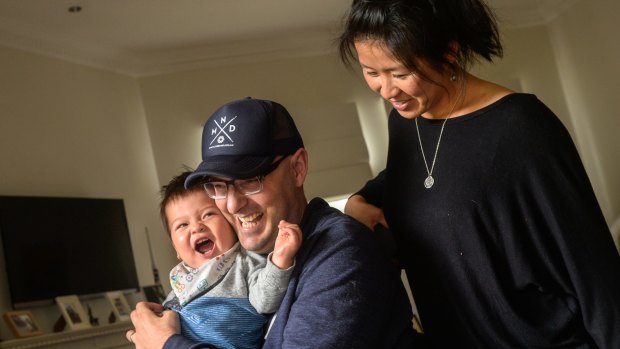 Ian Davis with wife Melissa Yang and their son Archie. Dr Davis has motor neurone disease and is campaigning to raise funds to find a cure.