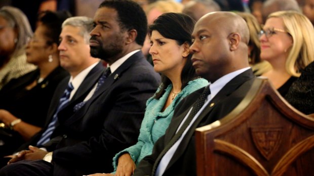 South Carolina Senator Wendell Gilliard, South Carolina Governor Nikki Haley  and US Senator Tim Scott at a prayer vigil for the victims of the Charleston shootings.