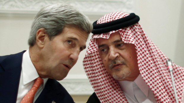 US Secretary of State John Kerry with Saudi Arabia's Foreign Minister Prince Saud al-Faisal in Riyadh in 2013.
