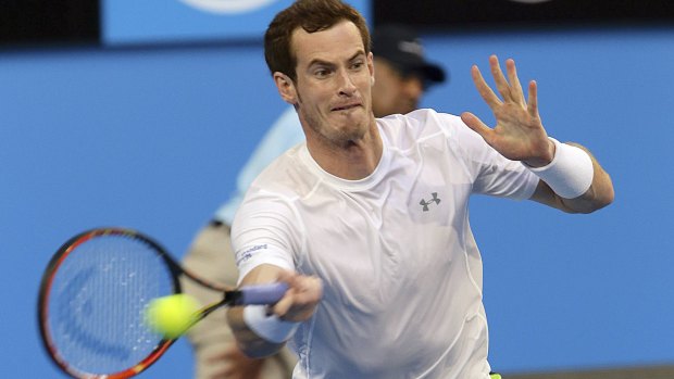 Injury concern: Andy Murray plays a forehand on his way to defeating France's Benoit Paire at the Hopman Cup in Perth.