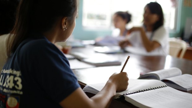 Former cybersex victims participate in a study course at a counselling centre for  survivors in Manila, the Philippines capital.