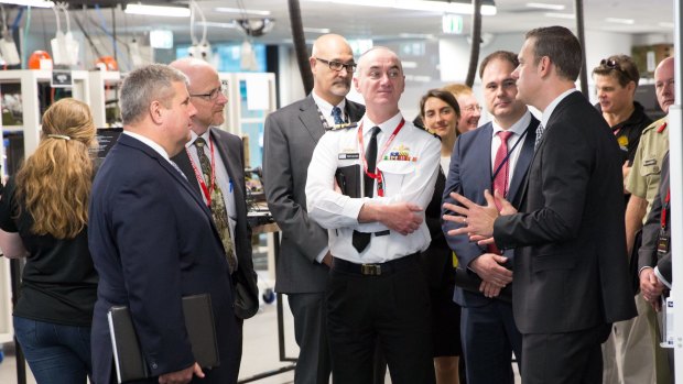 Rear Admiral Tony Dalton was taken on a tour of Boeing Defence Australia's Brisbane laboratory on Wednesday.