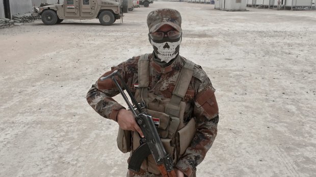 Iraqi army soldier Loay Mahdi, from Kirkuk, at the Qayara West Coalition base some 50 kilometers south of Mosul.