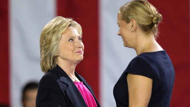 Democratic presidential candidate Hillary Clinton, or someone who looks a lot like her, shakes hands with a US Air Force reservist.