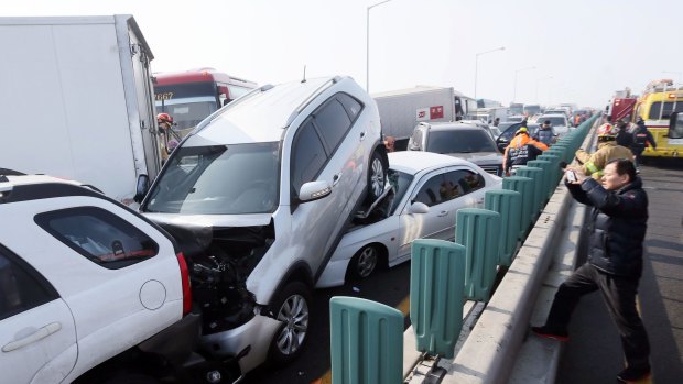 Damaged vehicles sit on Yeongjong Bridge in Incheon, South Korea.