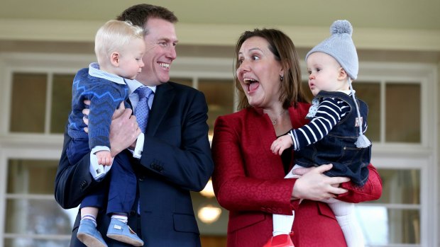 Christian Porter, with his son Lachlan, and Kelly O'Dwyer, with her daughter Olivia, at the ministerial swearing ceremony in July 2016.