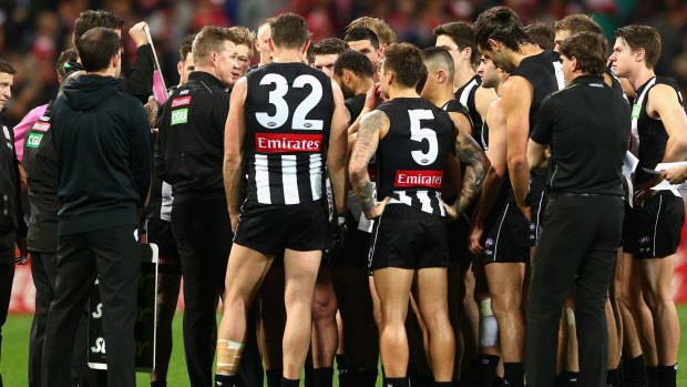Nathan Buckley talks to his players during the match against Sydney. Unfortunately, his team did not end up on the right side of the ledger.