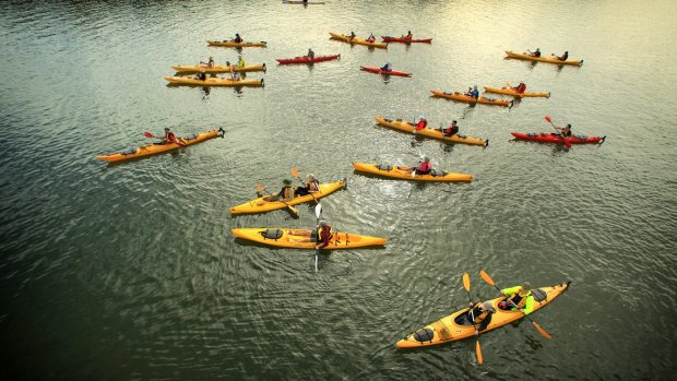 Kayaks and canoes from the Parramatta River Catchment Group at Armory Wharf, Homebush.